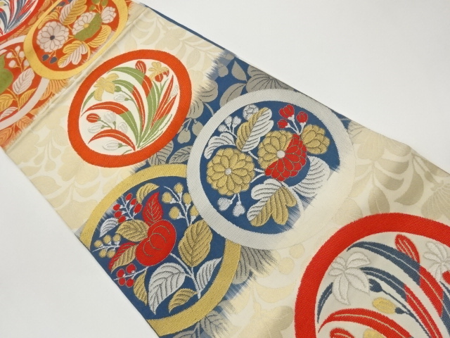 丸文に花々模様織出し袋帯